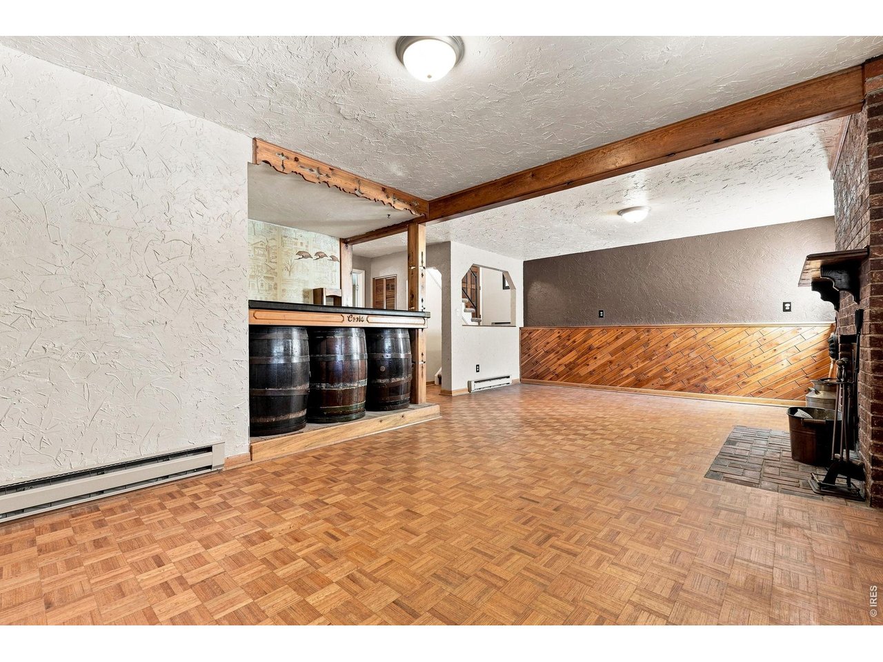 Property Photo 30 Family Room with fireplace and bar area