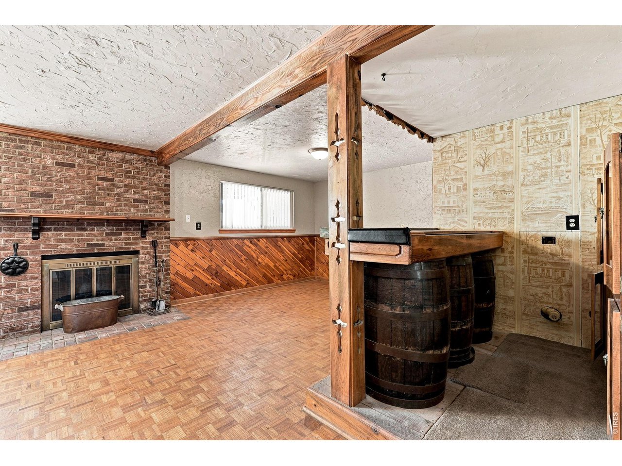 Property Photo 32 Family Room with fireplace and bar area
