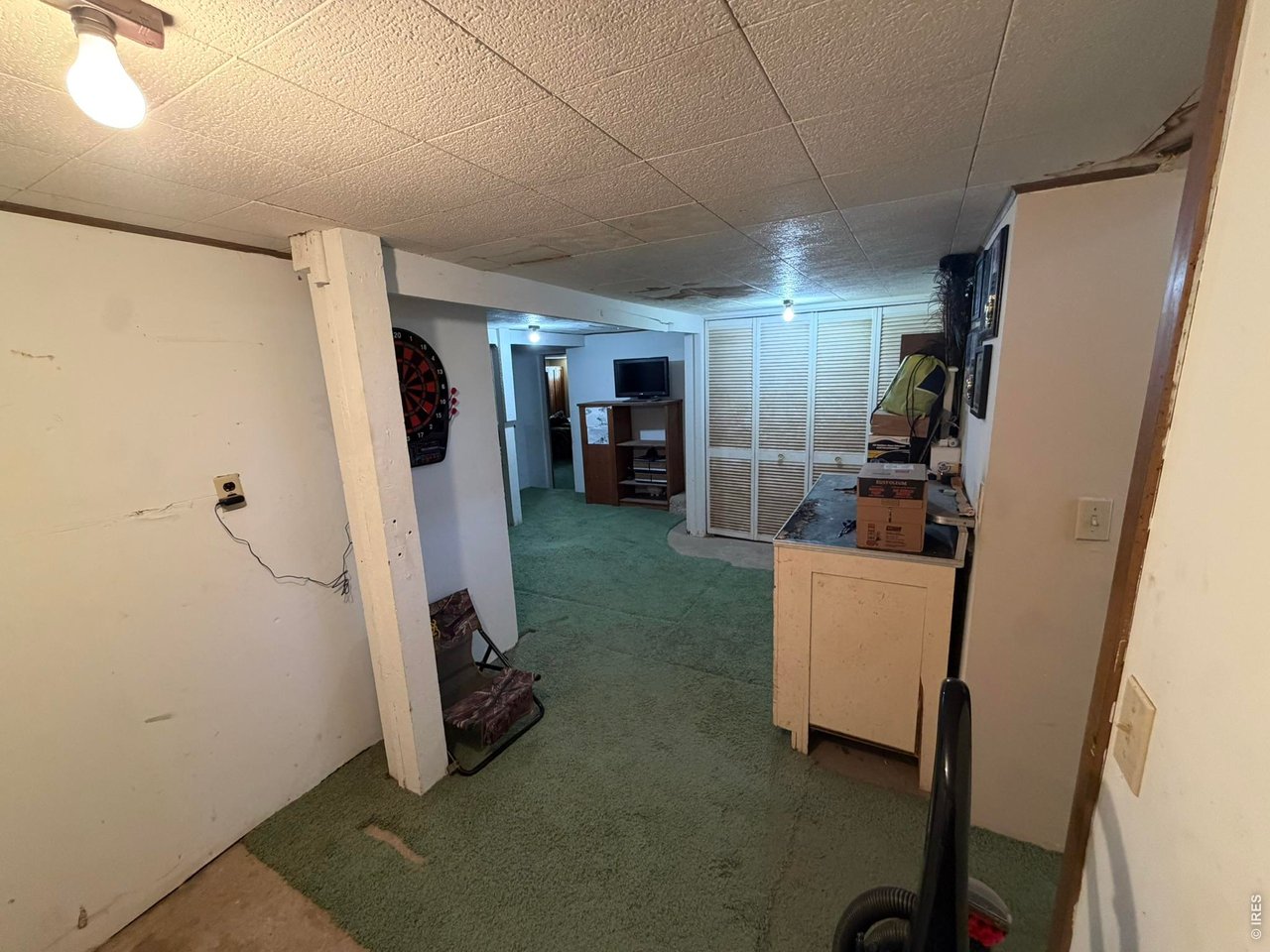Property Photo 32 Basement entryway/storage area