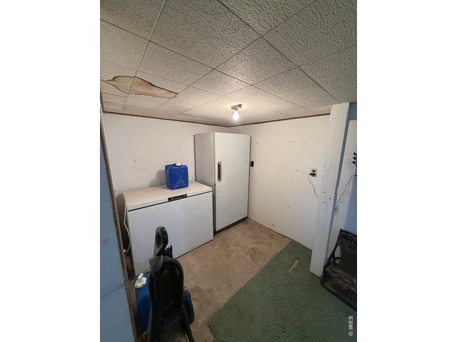 Property Photo 33 Basement entryway/storage area