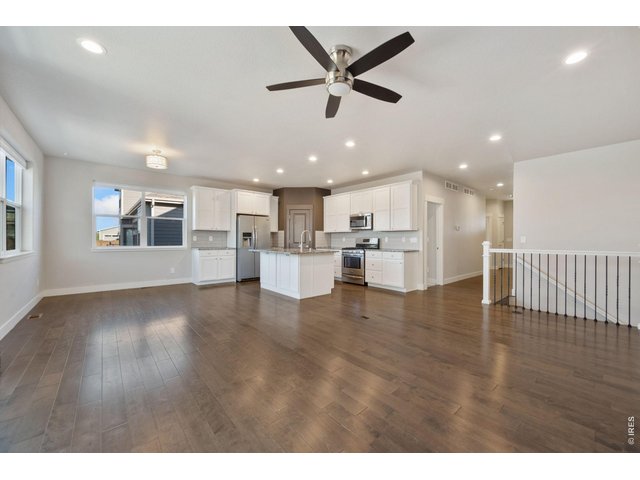 Property Photo 8 Great room, dining room and kitchen.