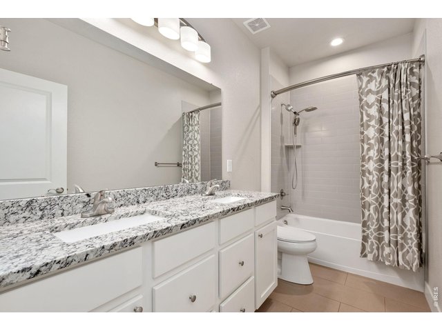 Property Photo 18 Four piece secondary bathroom.