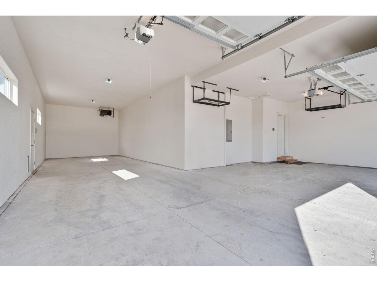 Property Photo 29 1176 Sq Ft Garage with a door that leads to the backyard.