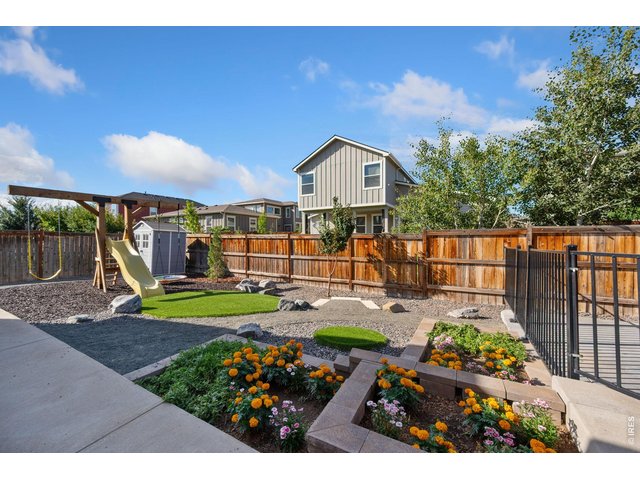 Property Photo 34 Backyard with lots of room for playing.