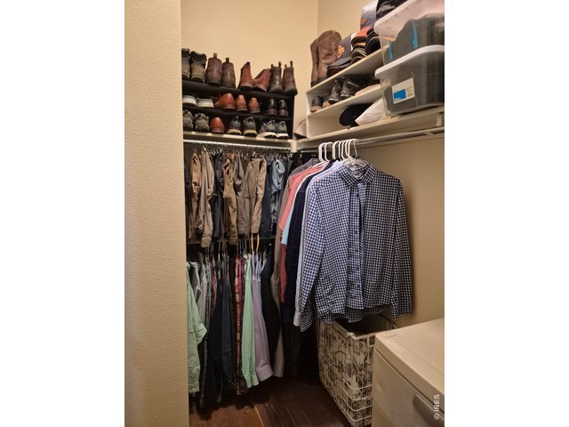 Property Photo 20 Expansive master closet with cedar wood.