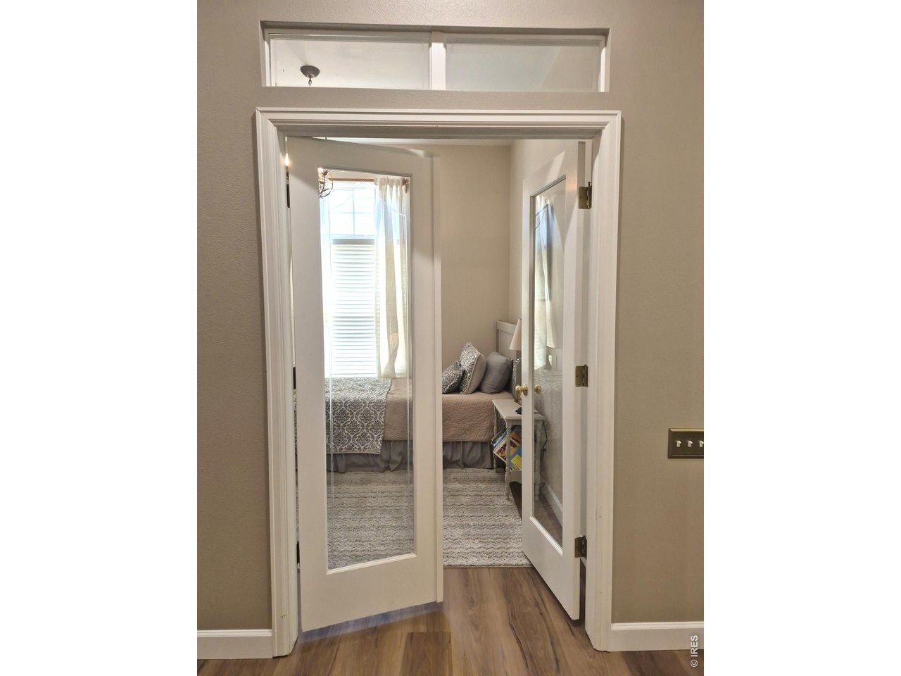 Property Photo 24 French glass doors.  Custom curtains for privacy.