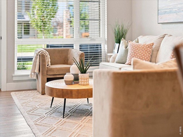 Property Photo 4 Modern design, desirable colors, and full of sunshine