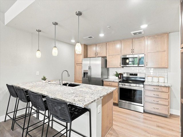 Property Photo 13 Ample cabinetry and counter space to prep and entertain