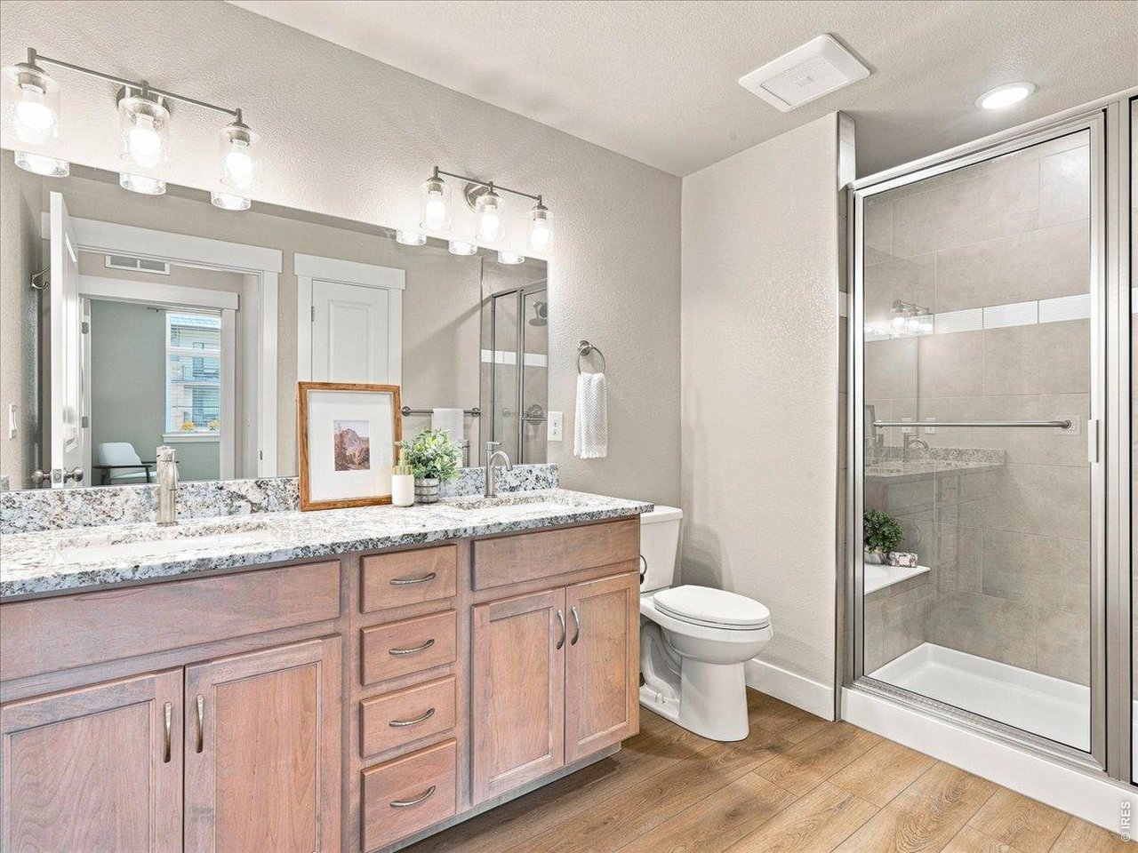 Property Photo 24 Bath with dual sinks, great storage and new granite, just added by the seller.