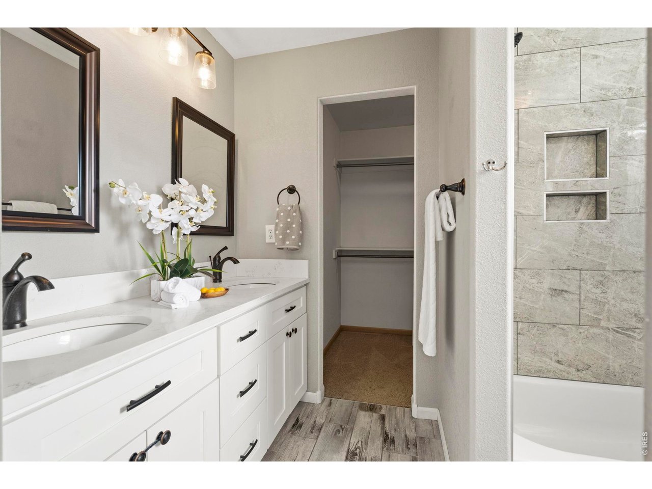 Property Photo 21 Primary ensuite bath with quartz tops and double vanity