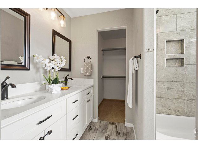 Property Photo 21 Primary ensuite bath with quartz tops and double vanity
