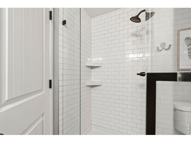 Property Photo 27 Hall bath tile surround
