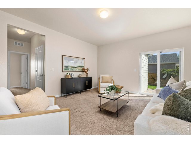 Property Photo 13 Main Living Area with Abundance of Natural Light