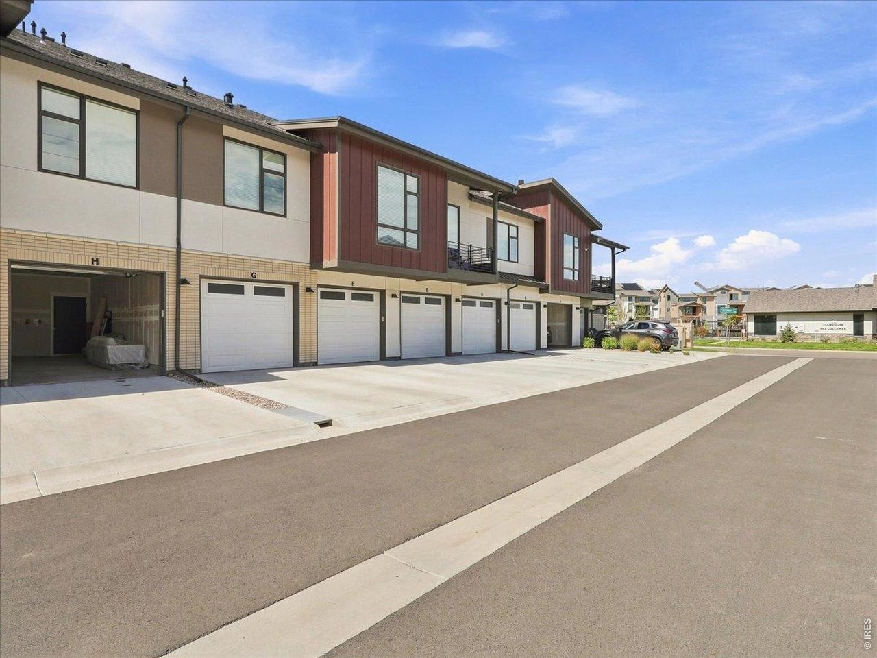Property Photo 30 Oversized single stall garage with a convenient parking pad convenient for additional parkin spot
