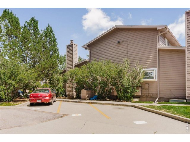 Property Photo 28 There is one deeded parking spot in the rear of the building #5, not shown here in this side pic