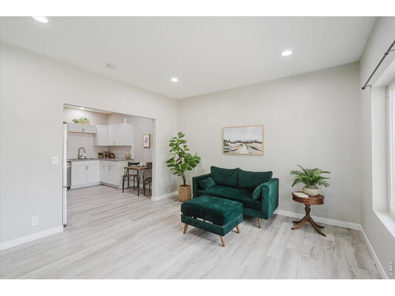 Property Photo 3 Bright and open living, dining and kitchen space