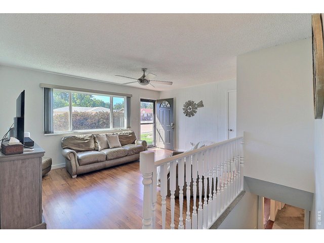 Property Photo 7 Living Room with Lots of Natural Light