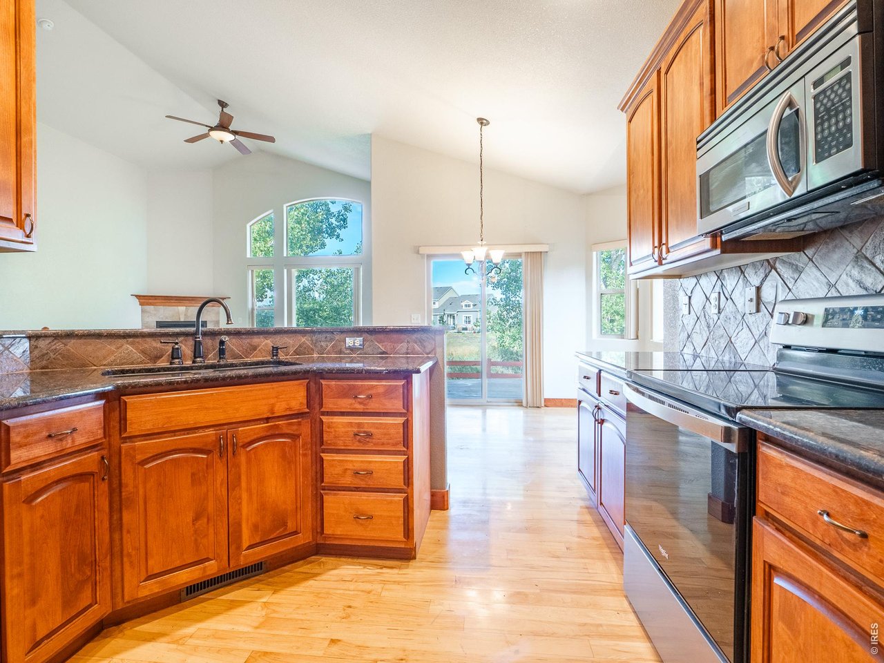 Property Photo 24 Alder cabinetry by Tharp Custom Cabinetry