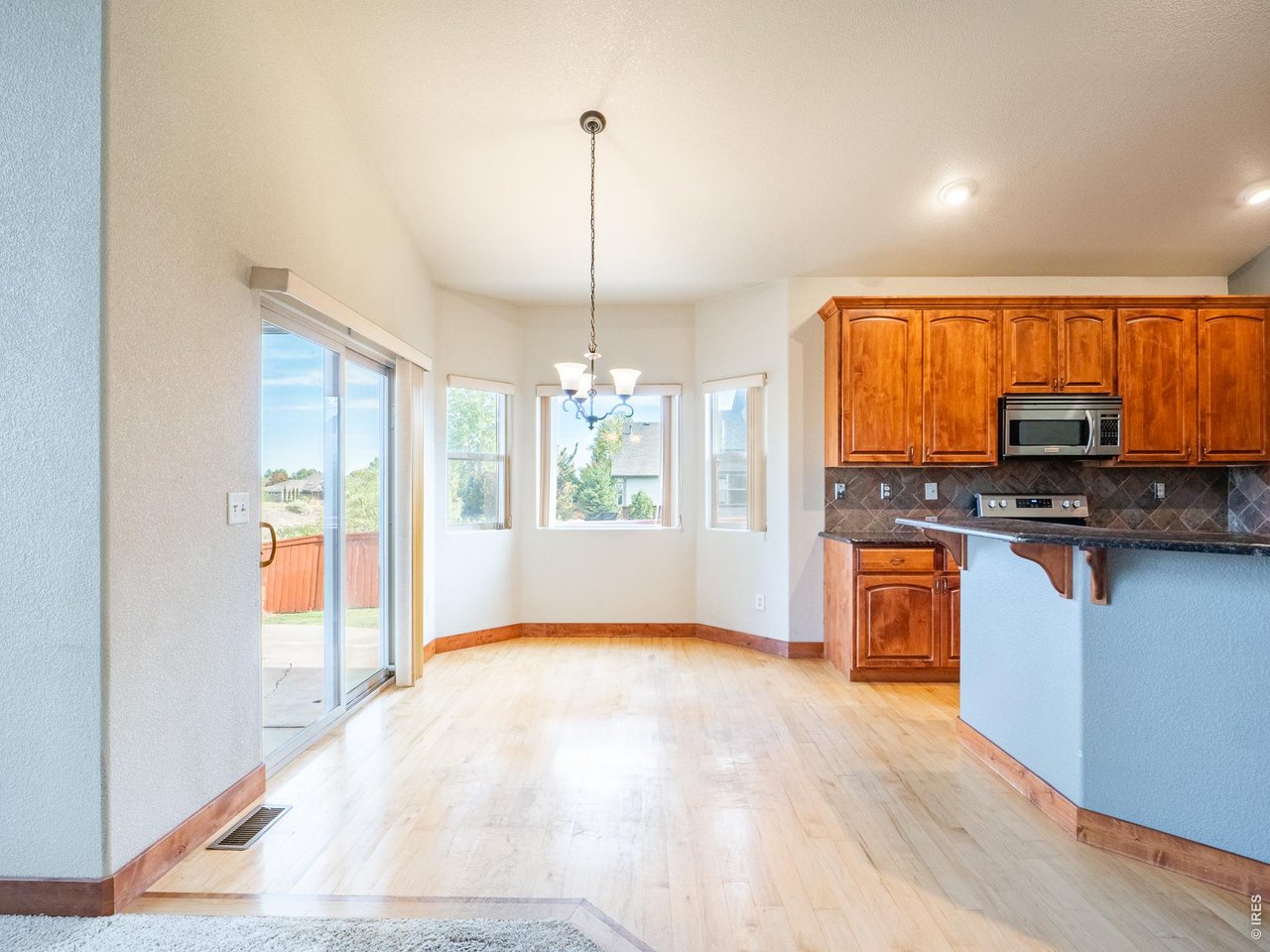 Property Photo 28 Hickory wood floor dining area