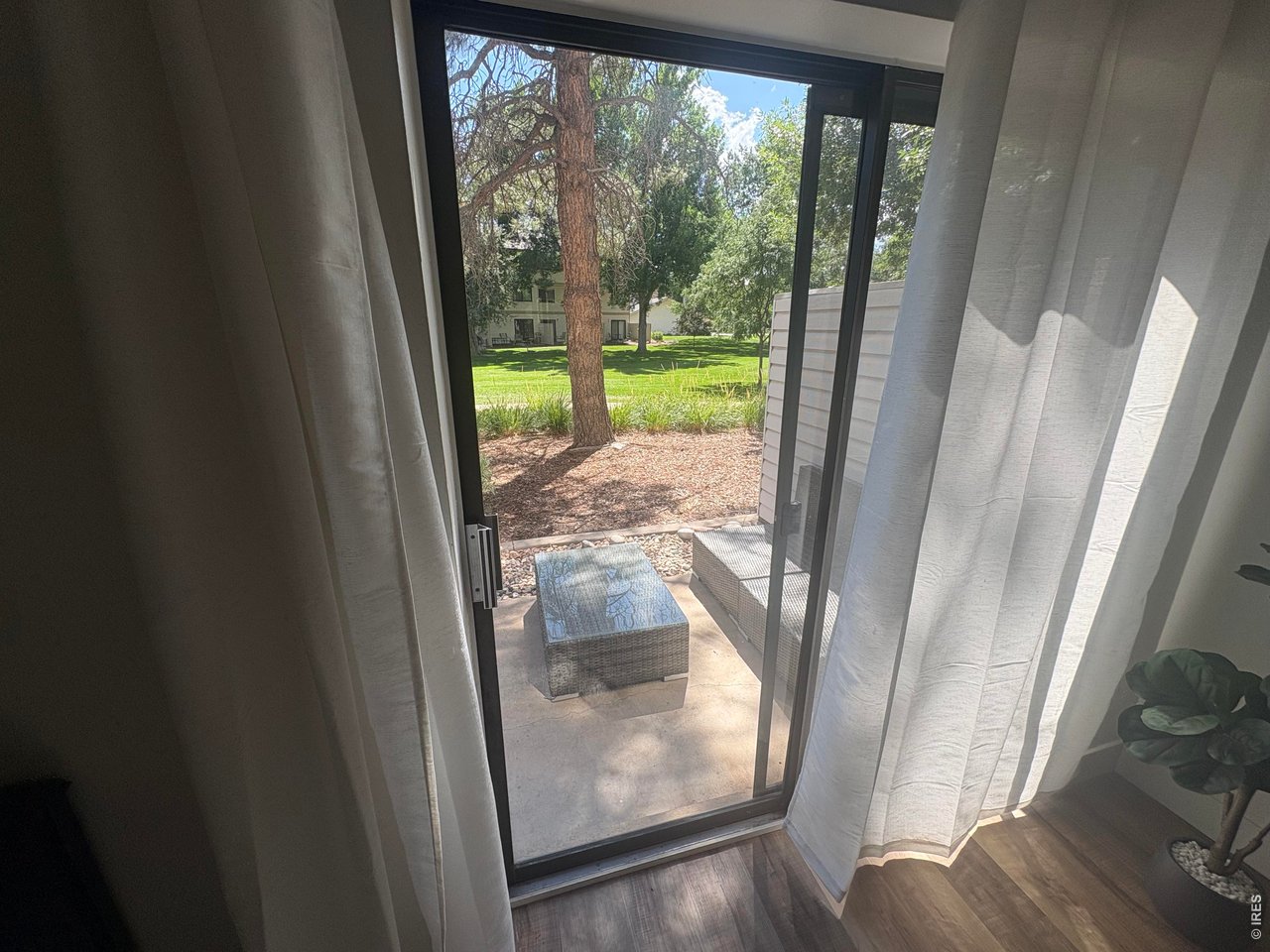 Property Photo 15 Slider door opens to back patio.