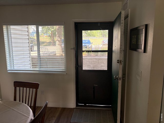 Property Photo 6 Unit opens up to dining room.