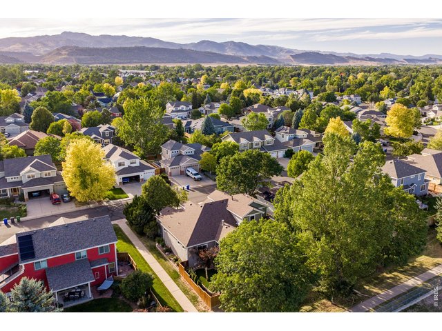 Property Photo 3 South side walkway and trails all around, exercise right outside your front door and onto the trail. Desirable west side location - close to Horsetooth and the Cathy Fromme Prairie and Natural Area!