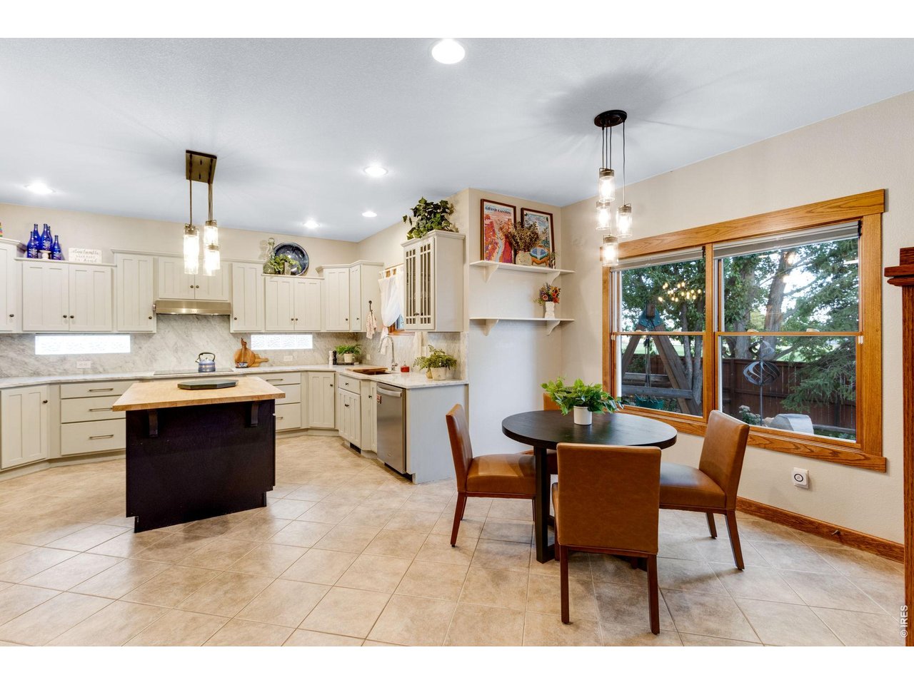 Property Photo 20 An Epicurean's Oasis - Gorgeous Remodel, with low maintenance large format tile floors, Breakfast nook, and all Carrara Marble Countertops and backsplash!