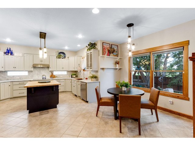 Property Photo 20 An Epicurean's Oasis - Gorgeous Remodel, with low maintenance large format tile floors, Breakfast nook, and all Carrara Marble Countertops and backsplash!