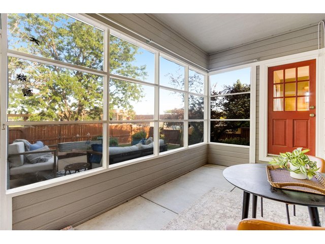 Property Photo 30 Tucked along the east side of the home, the sunroom offers a tranquil retreat-perfect for morning coffee.