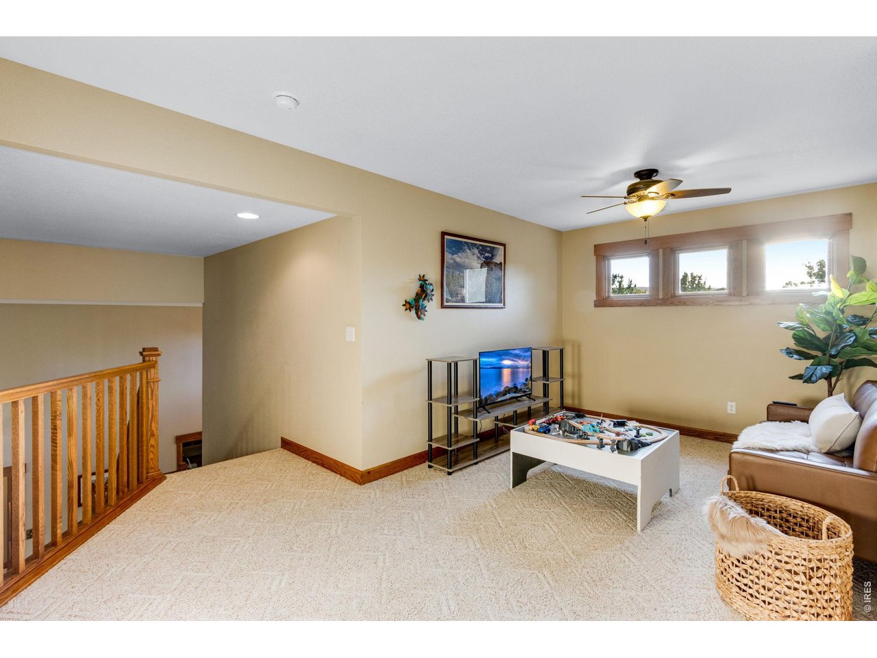 Property Photo 33 Upper Loft area - could be a 2nd floor office, or TV or playroom, sunny and bright west facing!