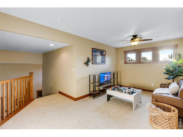 Property Photo 33 Upper Loft area - could be a 2nd floor office, or TV or playroom, sunny and bright west facing!