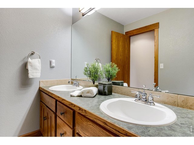 Property Photo 35 Upper level secondary bathroom - double sinks! Solid core doors throughout!