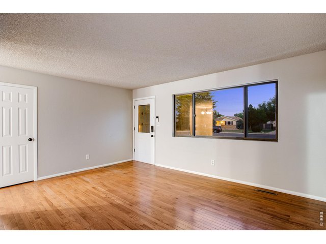 Property Photo 9 Hardwood floors and white trim