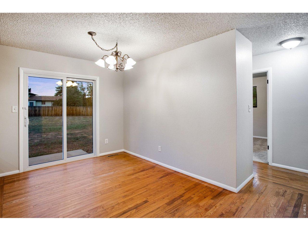 Property Photo 11 Dining Area with Patio Access