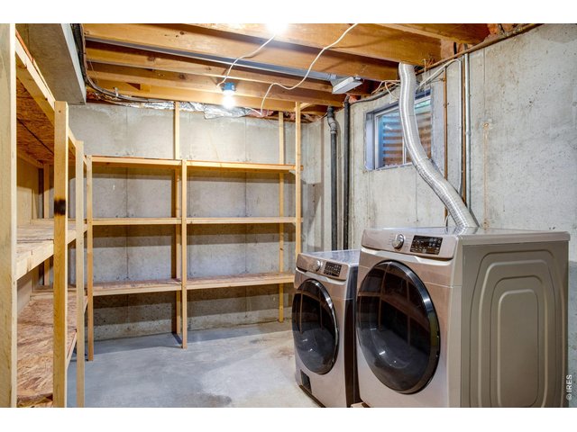 Property Photo 35 Utility room/laundry with plenty of storage and both washer and dryer are included