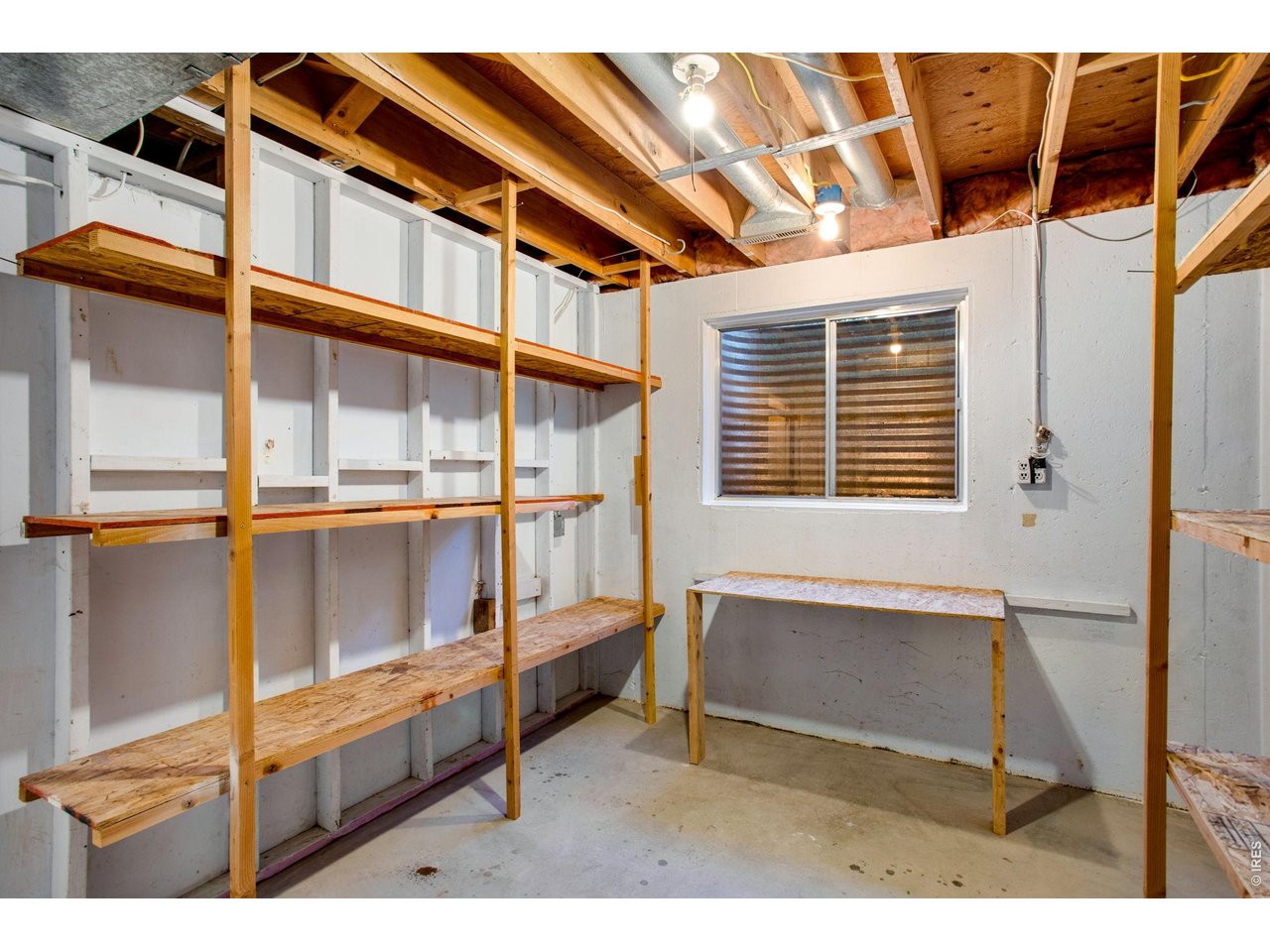 Property Photo 36 Unfinished storage area is perfect for a gym, crafts or can convert into an office