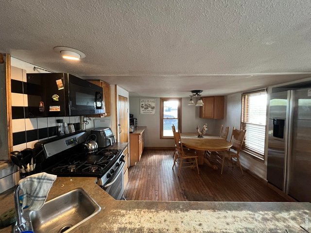 Property Photo 2 As you see Kitchen/dining room with east and south exposure