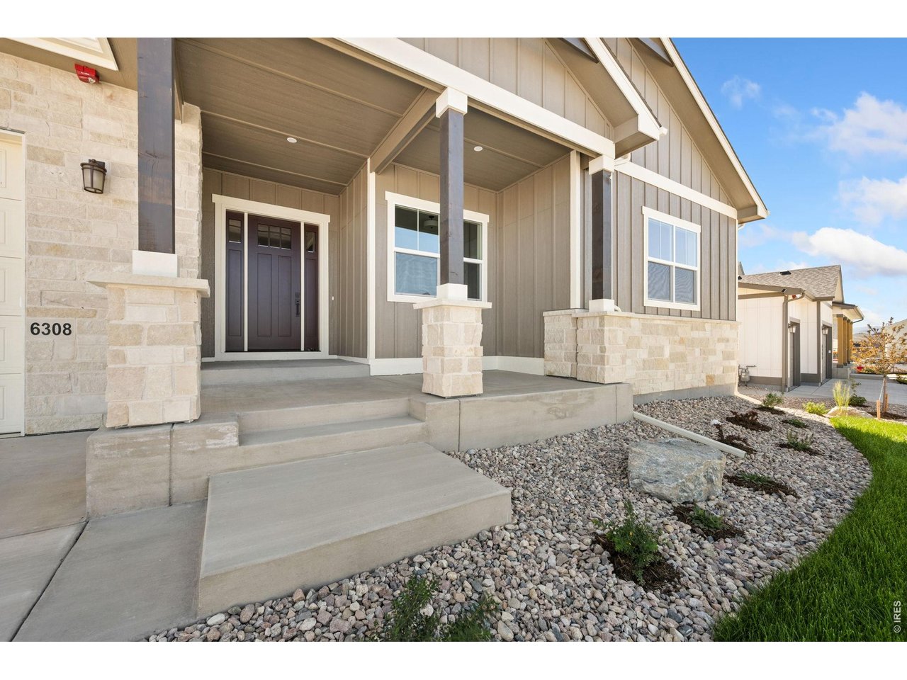 Property Photo 4 Welcoming front porch.