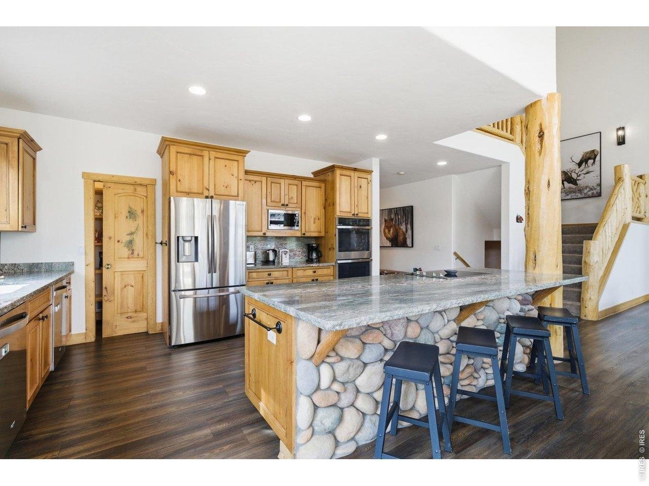 Property Photo 4 Open concept kitchen with oversized kitchen island perfect for entertaining