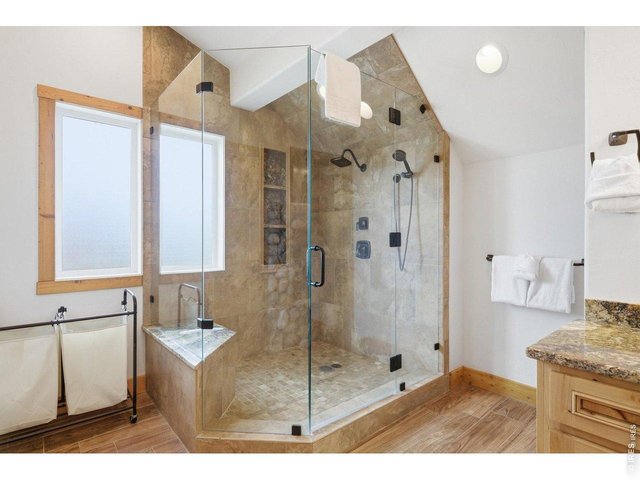 Property Photo 26 Warm and inviting primary bath retreat perfect after a day in the mountains