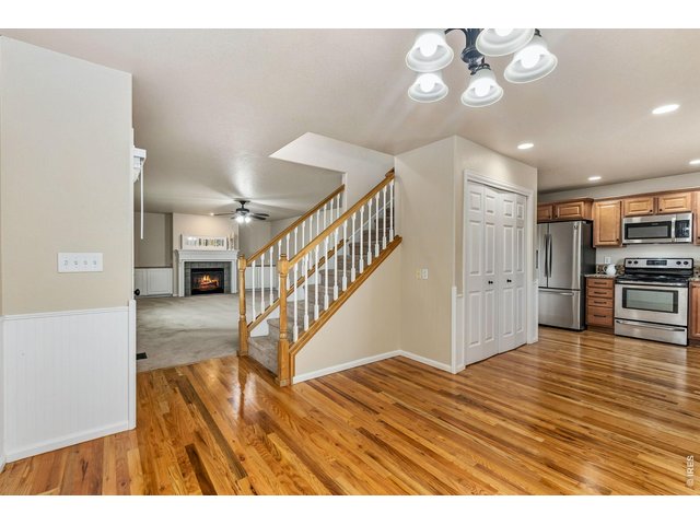 Property Photo 11 The open floor plan creates effortless flow for entertaining friends or enjoying quiet evenings at home