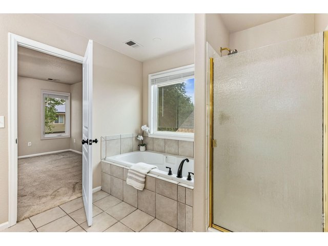Property Photo 21 Imagine relaxing at the end of a long day in the large soaking tub