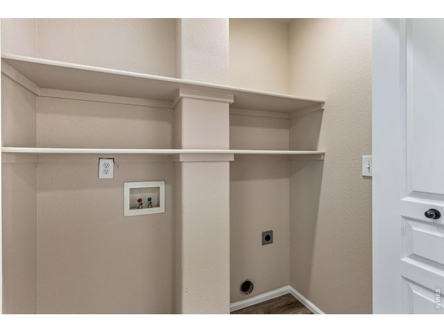 Property Photo 36 Two additional bedrooms, a full bath, and conveniently located upstairs laundry complete the second level