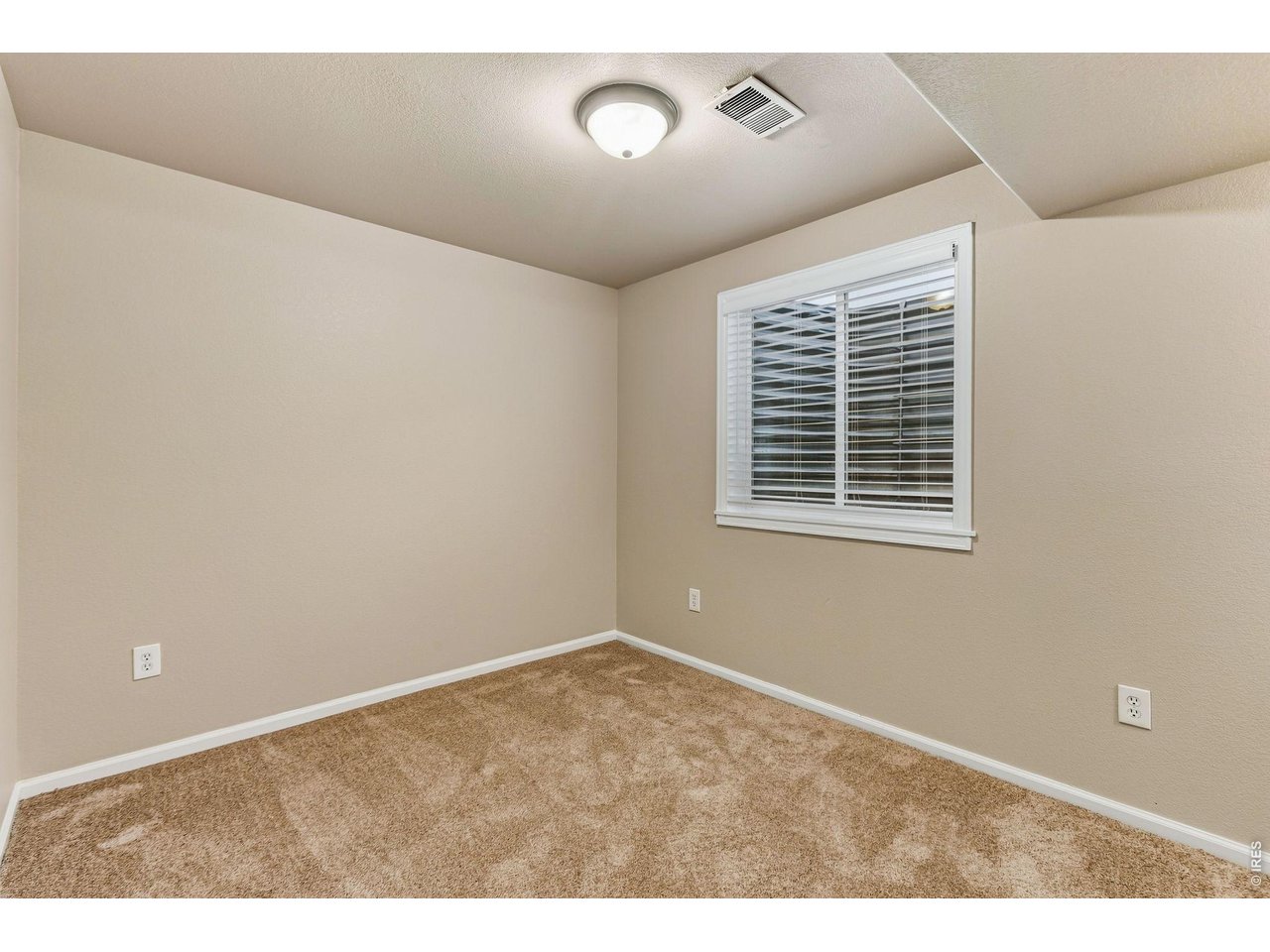 Property Photo 33 Fresh interior paint and new carpet create a clean and bright space