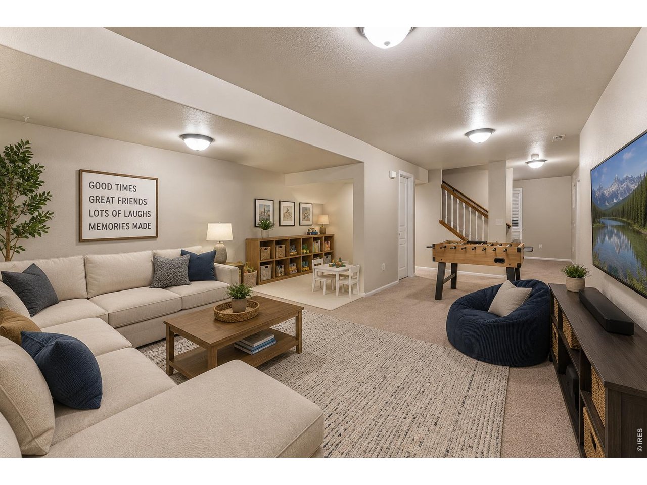 Property Photo 27 Imagine spending time with family and friends in the basement rec room! Virtually staged
