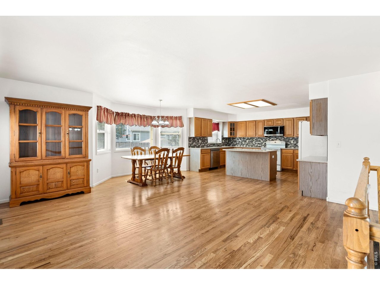 Property Photo 9 Wood floors in the kitchen and dining areas