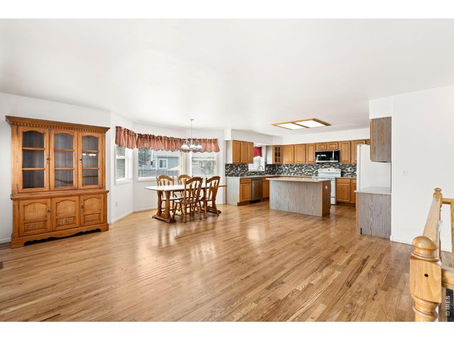 Property Photo 9 Wood floors in the kitchen and dining areas