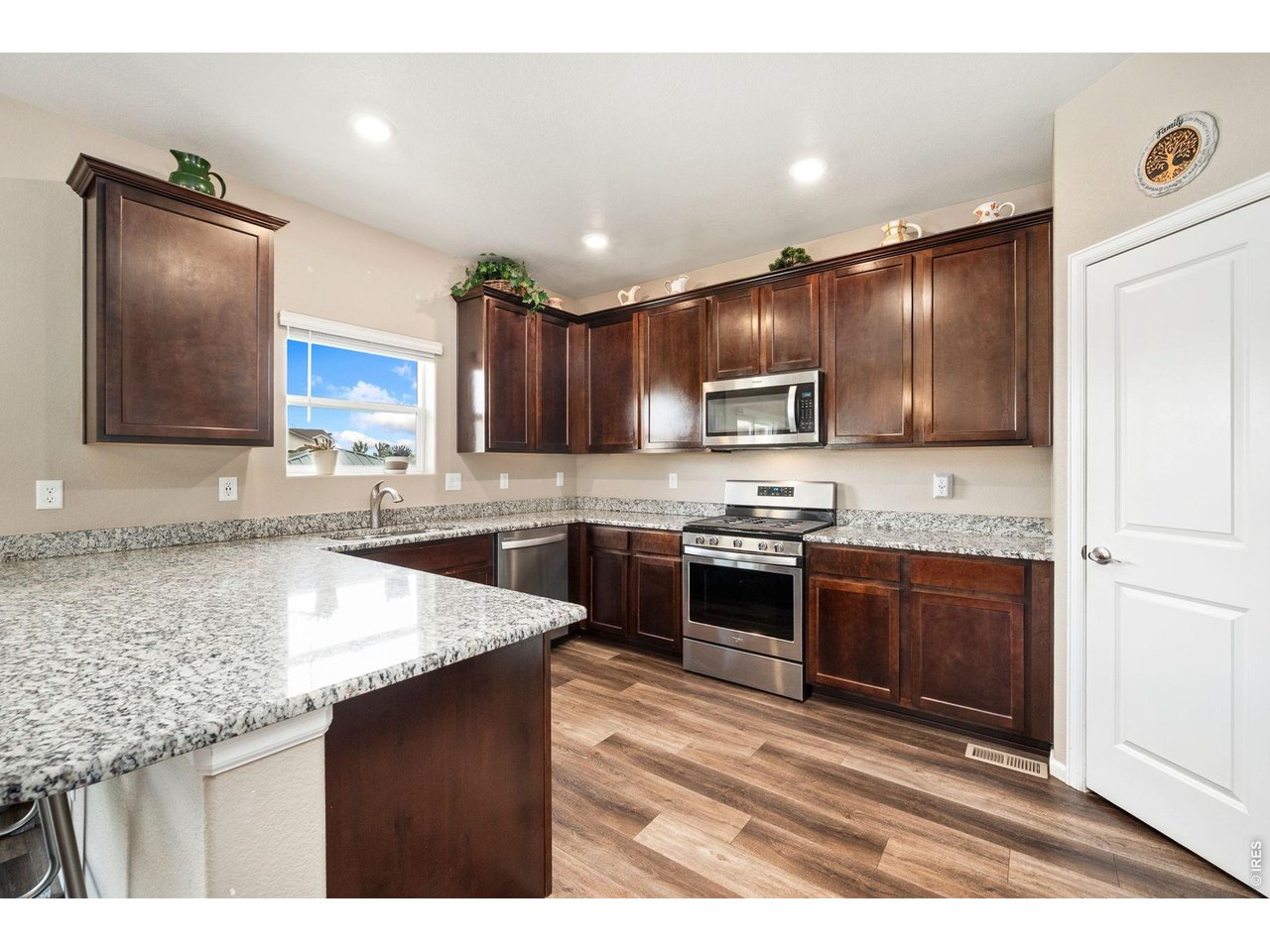 Property Photo 10 Granite countertops, gas range, stainless appliances