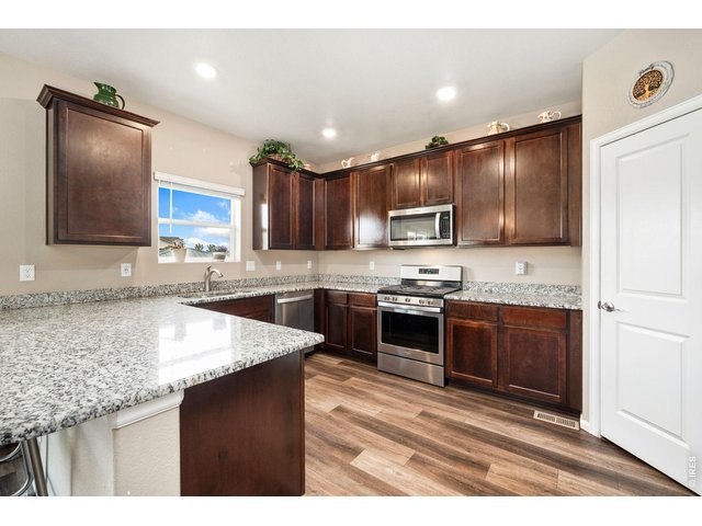 Property Photo 10 Granite countertops, gas range, stainless appliances