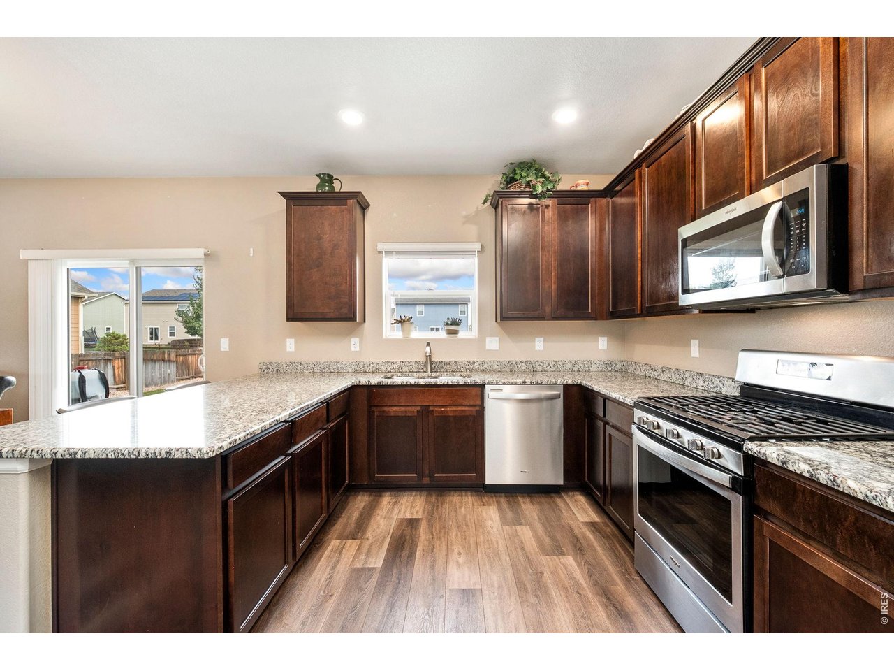 Property Photo 9 Granite countertops, gas range, stainless appliances